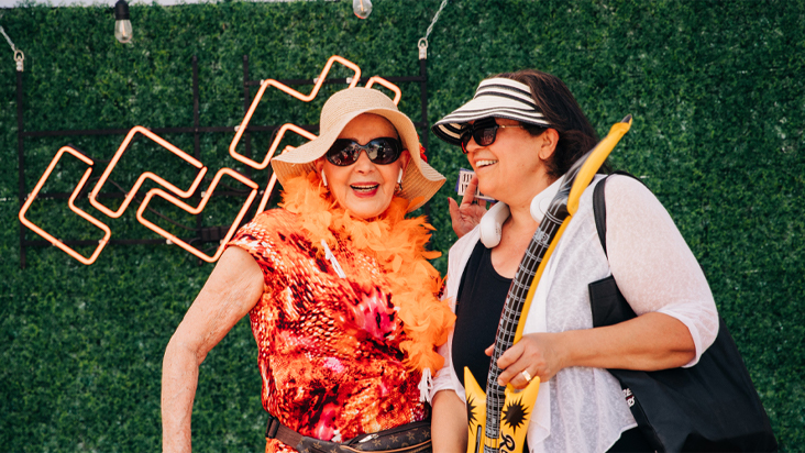 two women smiling at camera in Canvas outfits